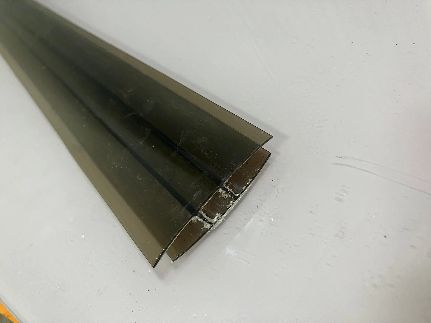 5/16 in. (8mm) 144 in. Polycarbonate Bronze H profile